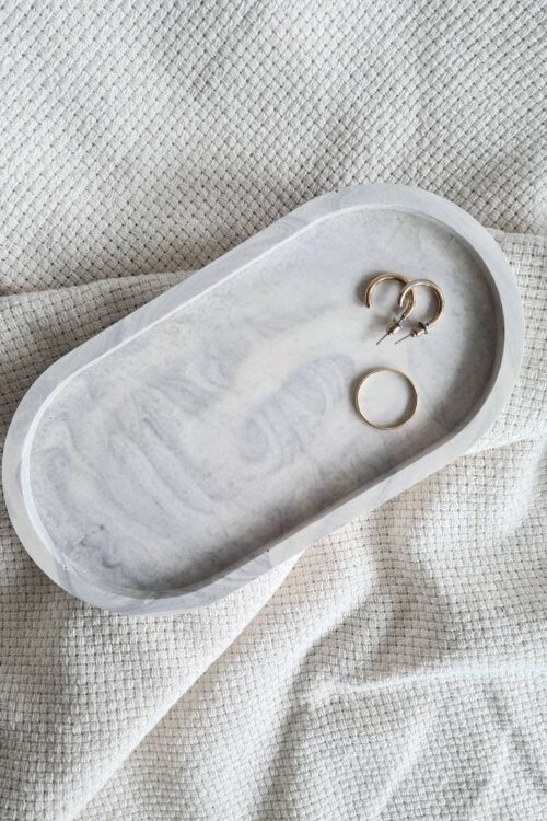 Oval jewerly dish made with gray and white Jesmonite